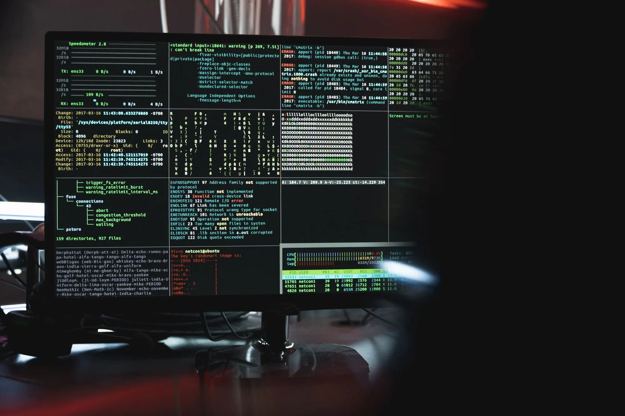 Terminal windows on a dark monitor